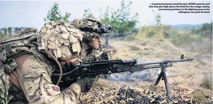  ?? Cpl Andy Reid ?? > A general-purpose machine gun (GPMG) gunner and link man sits high above the final live-fire range, taking out enemy positions in the fighting area so his colleagues can push forward