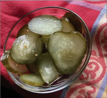  ?? JANET PODOLAK — THE NEWS-HERALD ?? Easy-to-make bread and butter pickles are ideal to use on hot dogs and hamburgers.