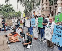  ?? | DUNCAN GUY ?? THE topical line ‘I can’t breathe’, from the George Floyd murder in the US, made its way into this week’s Earth Day event in Durban, to highlight air pollution.