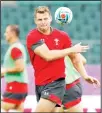  ??  ?? Wales flyhalf Dan Bigger passes the ball during a training session ahead of their Pool A Rugby World Cup game against Fiji at Oita Stadium, Oita, Japan on Oct 8. (AP)