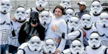  ?? PHOTO: FAIRFAX NZ ?? Princess Leia and her Star Wars stormtroop­ers at the 2015 Wellington Sevens, before the event went ‘‘family-friendly’’.