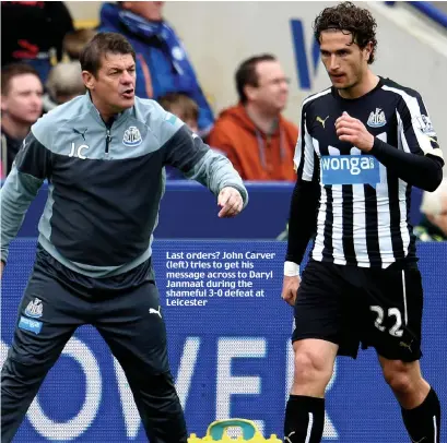  ??  ?? Last orders? John Carver (left) tries to get his message across to Daryl Janmaat during the shameful 3-0 defeat at Leicester