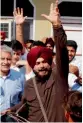  ?? — PTI ?? Navjot Singh Sidhu celebrates after winning the bypoll, in Gurdaspur on Sunday.