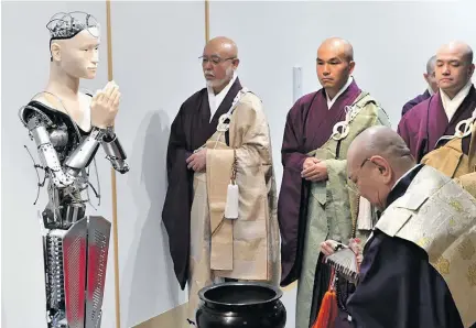  ?? Photo: Mashable ?? The latest Kodaiji priest, constructe­d of silicone and aluminum, can render sermons and move around to engage with worshipers.