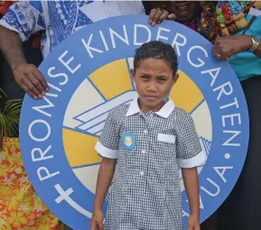  ?? Photo: Simione Haravanua ?? Grace Salom of Promise Kindergart­en, Tamavua, with her new school uniform during the opening of their new kindergart­en on January 11, 2019.