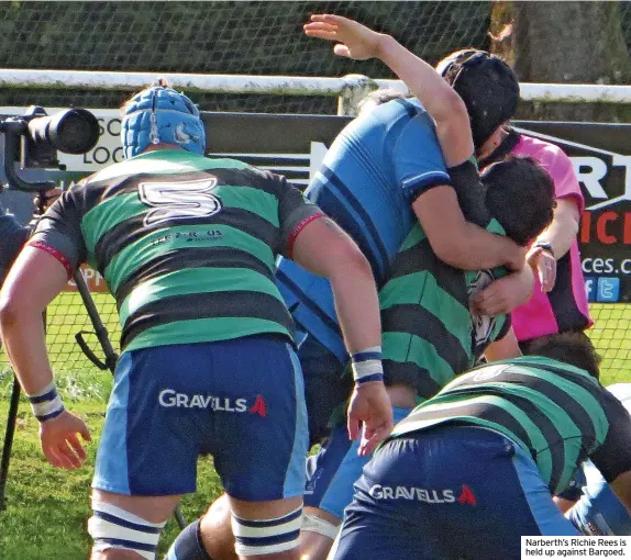  ?? ?? Narberth’s Richie Rees is held up against Bargoed.