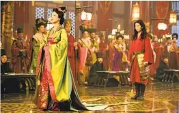  ?? DISNEY ?? Ming-na Wen (left), the actress who voiced Mulan in the 1998 animated Disney film, appears at the end of the new live-action movie in a cameo role.