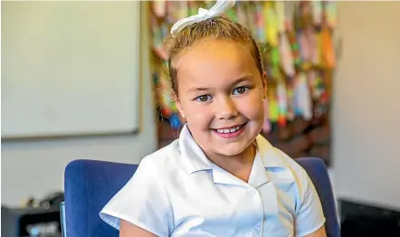  ??  ?? Grace Galloway, 6, says her mum is special because she looks after her. ‘‘She gives me a wet towel if I scrape my leg,’’ Grace says.