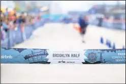  ?? ?? A 32-year-old runner, David Reichman of Brooklyn, died after collapsing at the finish line of the Brooklyn Half Marathon on Sunday.