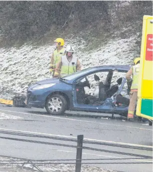  ??  ?? Emergency services at the scene of a crash on the south bound side of the Central Motorway in Newcastle City Centre