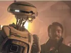  ?? LUCASFILM ?? Droid L3-37 (Phoebe Waller-Bridge) and Lando (Donald Glover) ... now how would that work?