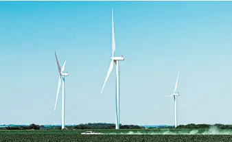  ?? WALKER PICKERING/THE NEW YORK TIMES ?? EDF completed some wind turbines, but the pandemic has delayed work at a wind farm under constructi­on in Milligan, Nebraska.