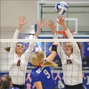 ?? Courier file photo ?? Benton junior Laci Bohannan, 8, and sophomore Abigail Lagemann, 10, go up for a block against the Bryant Lady Hornets in a match last year. Both Bohannan and lagemann will be a big part of Benton’s volleyball team this season.