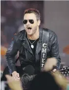  ?? RON JENKINS/THE ASSOCIATED PRESS ?? Eric Church will collaborat­e on a special performanc­e for this year’s Grammy Awards ceremony, in tribute to those who were killed at live music events this past year.