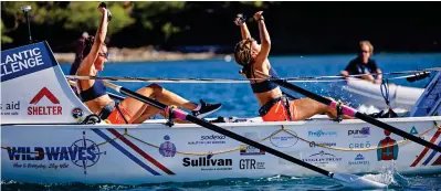  ?? ?? Victorious: The pair reach the finish line after more than 45 days of rowing across the ocean