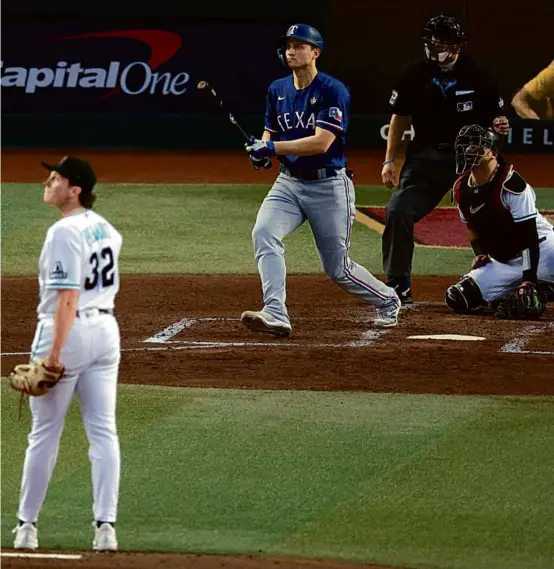  ?? SEAN M. HAFFEY/GETTY IMAGES ?? Corey Seager’s two-run homer off Arizona starter Brandon Pfaadt gave the Rangers a 3-0 lead in the third inning of Game 3.