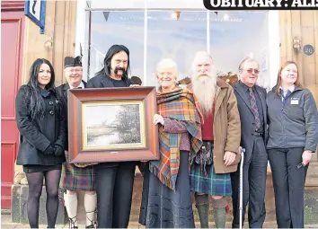  ?? ?? Norway link Ivan Storm Julissen of Bryne presented one of his paintings to Blairgowri­e during a visit to the town in 2012. Alistair Gibb, pictured second right, was instrument­al in the developmen­t of close ties between the locations. Pic: David Phillips