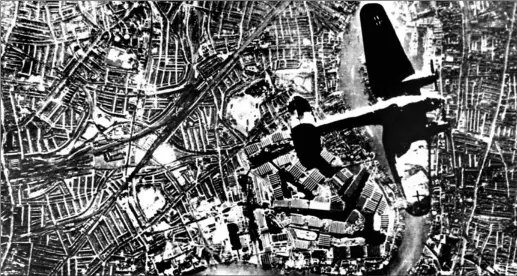  ?? AP FILE PHOTO ?? A German Heinkel bomber flies over London in 1940 over what could have been letter writer’s family home and the street where his mother came under fire from the sky.