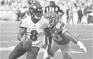  ??  ?? The Ravens and Lamar Jackson, being chased by Emmanuel Ogbah, will try to defeat the Super Bowl champion Chiefs on Sept. 28. DENNY MEDLEY/ USA TODAY SPORTS