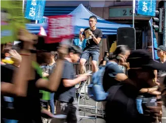  ??  ?? Law in Wan Chai, appealing to protesters for donations to help those arrested or injured by police