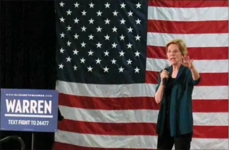  ?? ADRIAN SAINZ — THE ASSOCIATED PRESS ?? Democratic presidenti­al candidate Elizabeth Warren speaks to a group of about 400 potential voters at a high school on Sunday in Memphis, Tenn.