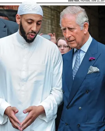  ??  ?? Praise: Prince Charles meeting imam Mohammed Mahmoud yesterday