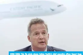  ??  ?? HONG KONG: This file photo shows Cathay Pacific’s chief executive officer Rupert Hogg speaking during a press conference on the company’s half-year results in Hong Kong. —AFP