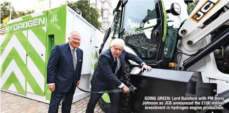  ?? ?? GOING GREEN: Lord Bamford with PM Boris Johnson as JCB announced the £100 million investment in hydrogen engine production.