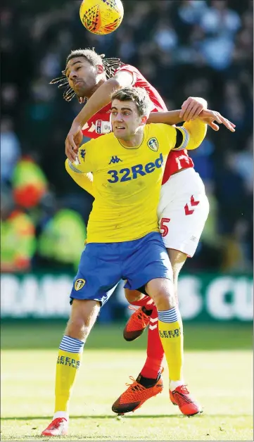  ??  ?? DUEL: Leeds United’s Patrick Bamford and Middlesbro­ugh’s Ryan Shotton challenge