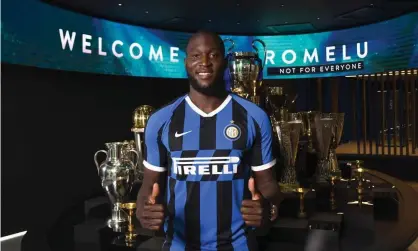  ??  ?? Romelu Lukaku poses in the Internazio­nale shirt after completing his move from Manchester United. Photograph: Claudio Villa - Inter/ Inter via Getty Images