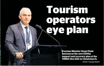  ?? Photo / George Heard ?? Tourism Minister Stuart Nash announces the new $200m support and recovery plan at the TRENZ Hui 2021 in Christchur­ch.