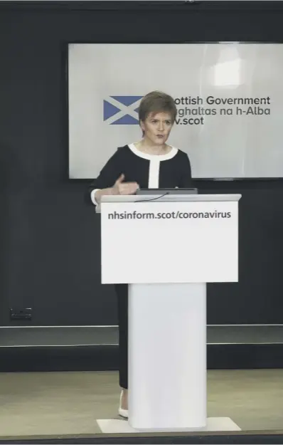  ??  ?? 0 Nicola Sturgeon and Health Minister Jeane Freeman give the daily coronaviru­s briefing in Edinburgh yesterday. The First Minister said Scotland cannot begin to lift lockdown yet