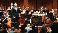  ??  ?? Iranian-Austrian cellist Kian Soltani (left), who plays on a 1680 cello by the brothers Giovanni and Francesco Grancino, and Miriam Manasherov (right) stand after playing solos in Richard Strauss’s “Don Quixote” at the Kennedy Center.