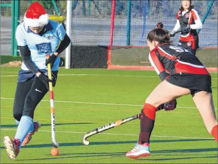  ?? Pictures: Chris Davey FM5018077, above, FM5018078, right. Buy these pictures from kentonline.co.uk ?? Above, Herne Bay ladies’ 2nds get into the Christmas spirit on Saturday but there were no early gifts from K Sports. Right, Sports have possession