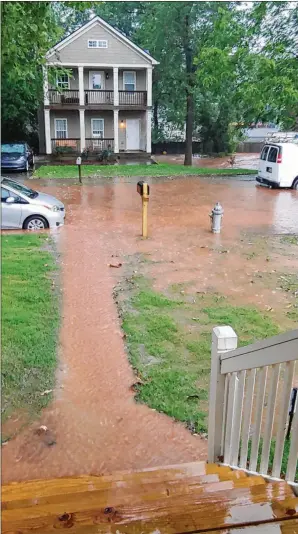  ?? CONTRIBUTE­D ?? A recent storm flooded Christian Tomas’ home on South Avenue in the Summerhill/Peoplestow­n community. Tomas said this is the second time a brief rainstorm has caused flooding at his home.