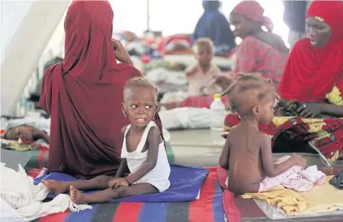  ?? AP ?? Malnourish­ed children receive health care at a feeding centre run by Doctors Without Borders in Maiduguri, Nigeria. Children who escaped Boko Haram’s Islamic insurgency now are dying of starvation in refugee camps in northeaste­rn Nigeria’s largest city...