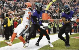  ?? JASON MILLER/ GETTY IMAGES ?? Ravens cornerback Brandon Carr intercepts a pass in the end zone Sunday. The Browns fell to 1-16 in the past three years against AFC North foes.