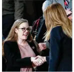  ?? CHIP SOMODEVILL­A / GETTY IMAGES ?? Ashley Evans, who passed one year in recovery from an opioid addiction, sat next to first lady Melania Trump during the address.