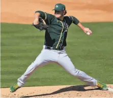 ??  ?? In his A’s debut, Cole Irvin threw two scoreless innings against the Rockies. “Off to a good start,” manager Bob Melvin said.
