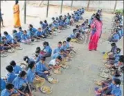  ??  ?? Children have mid-day meal at a government school in Jaipur.
HIMANSHY VYAS/FILE