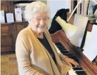  ??  ?? ●● Edith Lord on her 100th birthday at her beloved piano