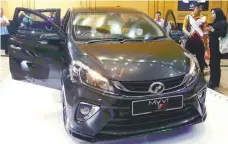  ??  ?? File photo shows the launch of the new Perodua Myvi in Putrajaya last year.