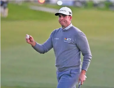  ?? AP PHOTO/DENIS POROY ?? Baylor School graduate Luke List holds his golf ball up after making a birdie putt on the 18th hole of the South Course at Torrey Pines in the Farmers Insurance Open on Saturday. List beat Will Zalatoris on the first hole of a playoff to earn his first PGA Tour victory at age 37.