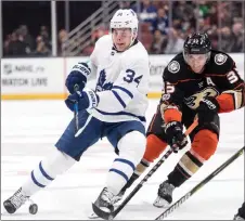  ?? CP PHOTO ?? Toronto forward Auston Matthews (34) took part in his first team practice on Wednesday since suffering an upper-body injury eight days ago.
