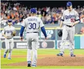  ?? MATT SLOCUM/ASSOCIATED PRESS ?? The Dodgers’ Dave Roberts and other MLB managers will face limited visits to the mound under new rules.