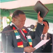  ?? Picture: REUTERS ?? TAKING OVER: President Emmerson Mnangagwa is sworn in during his inaugurati­on ceremony in Harare on Sunday.