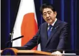  ?? —AFP ?? TOKYO: Japan’s Prime Minister Shinzo Abe gestures as he answers questions during a press conference at his official residence.