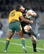  ?? AP ?? oN THe move: All blacks’ Ardie Savea (second left), attempts to break an Australian defense during their bledisloe cup rugby test. —