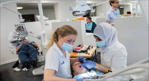  ?? FOTO: CASPER DALHOFF/RITZAU SCANPIX ?? Hos Danske Tandplejer­e er man ikke vilde med forslaget om gratis tandlaege.