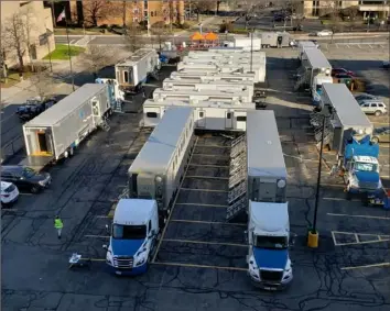  ?? Haddad's Inc. ?? Rows of trailers and trucks owned by Haddad’s Inc., a film and television equipment rental company based in Pleasant Hills, sit in a lot during a movie shoot.